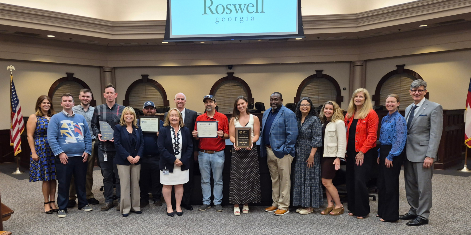 Mayor and Council Meeting Recap: May 26, 2026 Photo of City Council, Mayor, and staff posing with awards.